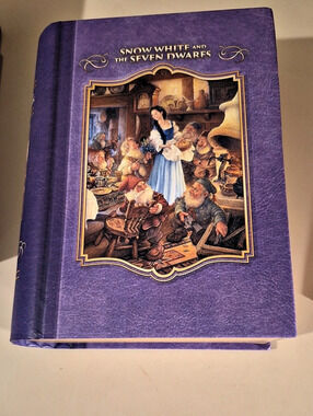 Master Pieces Snow White and the Seven Dwarfs 500 Piece Puzzle In Book Display